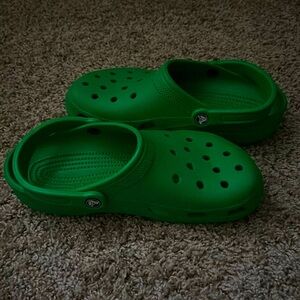 green crocs, size 8 in men 10 in women.
